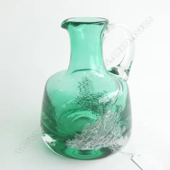 A heavy art glass jug